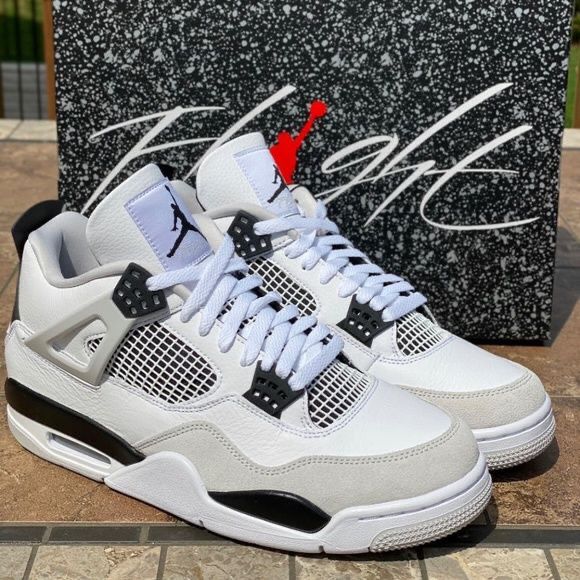 White & black Jordan 4s